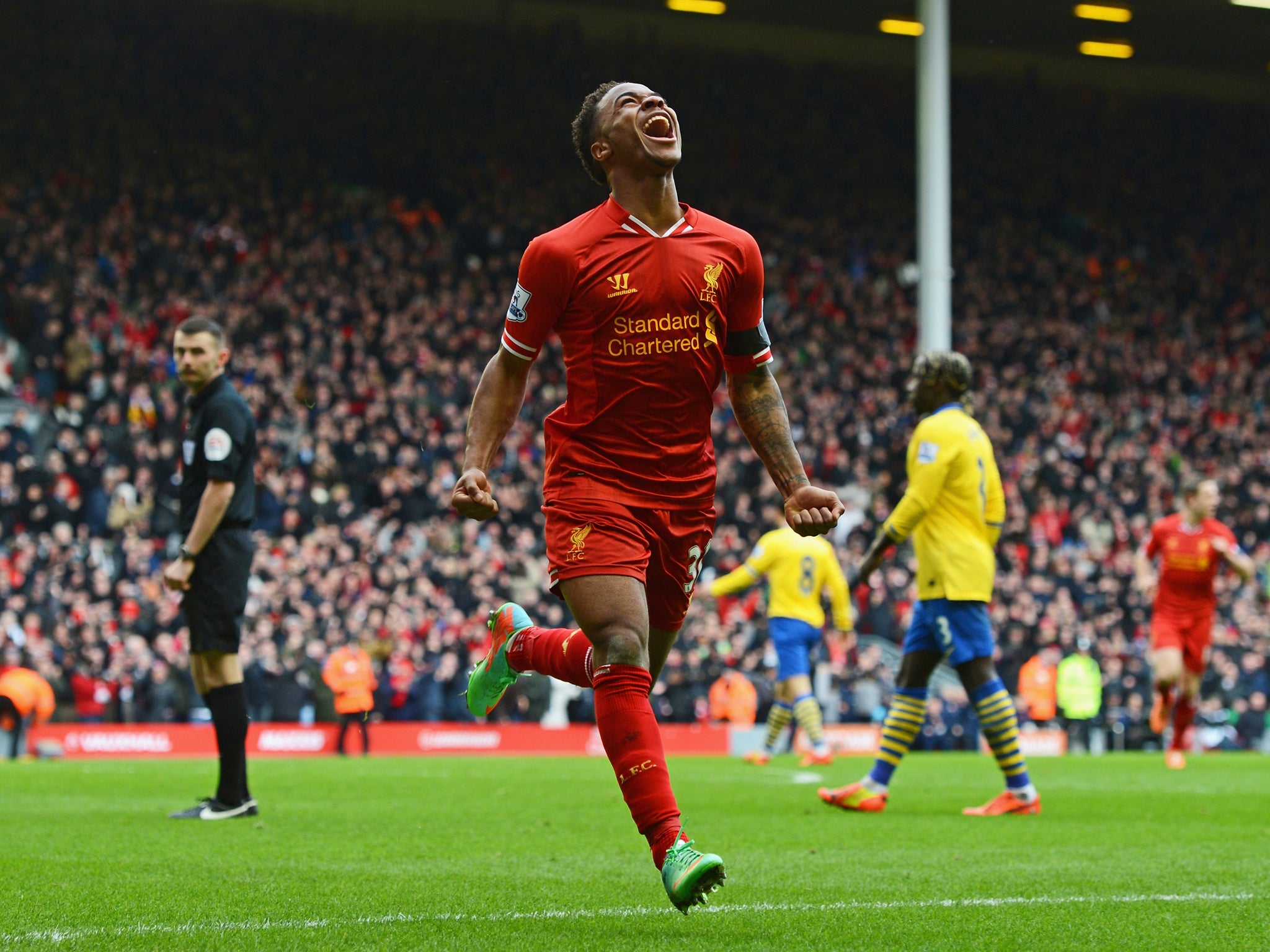 Raheem Sterling celebrates scoring in the victory over Arsenal for Liverpool