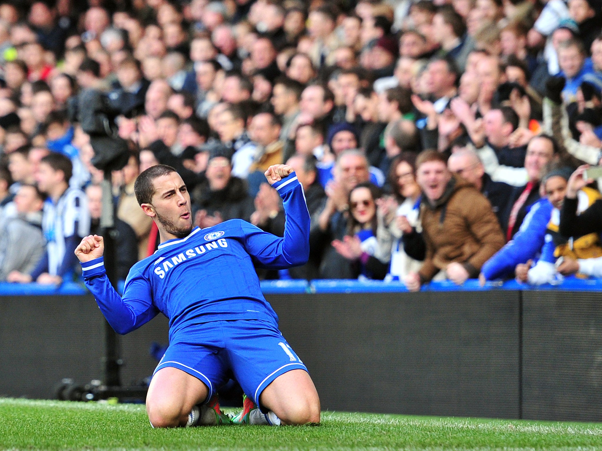 Eden Hazard celebrates his hat-trick for Chelsea in the win over Newcastle