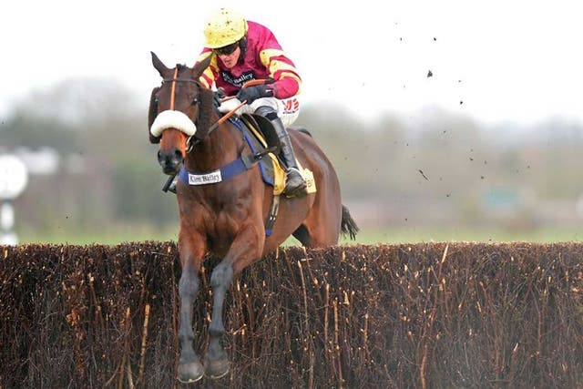 Happy hunter: Harry Topper heads for victory in the Denman Chase 