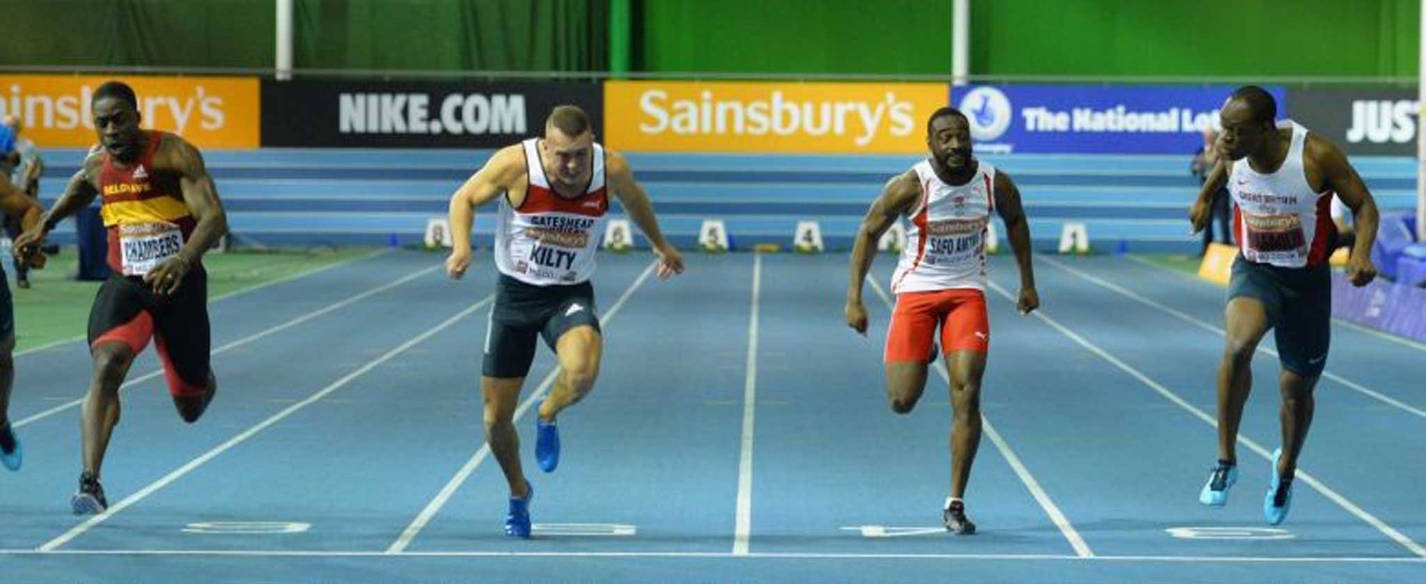 Sideways glance: James Dasaolu (far right) looks across the track at the finish to confirm that he has beaten Dwain Chambers (far left) despite a slow start