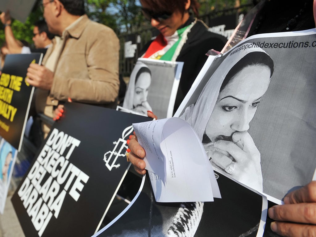 Members of the human rights charity Amnesty International protest outside the Iranian embassy in west London, on April 20, 2009. Amnesty International members demonstrated on Monday against the scheduled execution of a young Iranian woman Delara Darabi, w