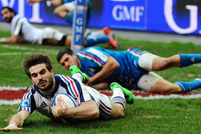 Hugo Bonneval of France scores a try during the Six Nations match against Italy