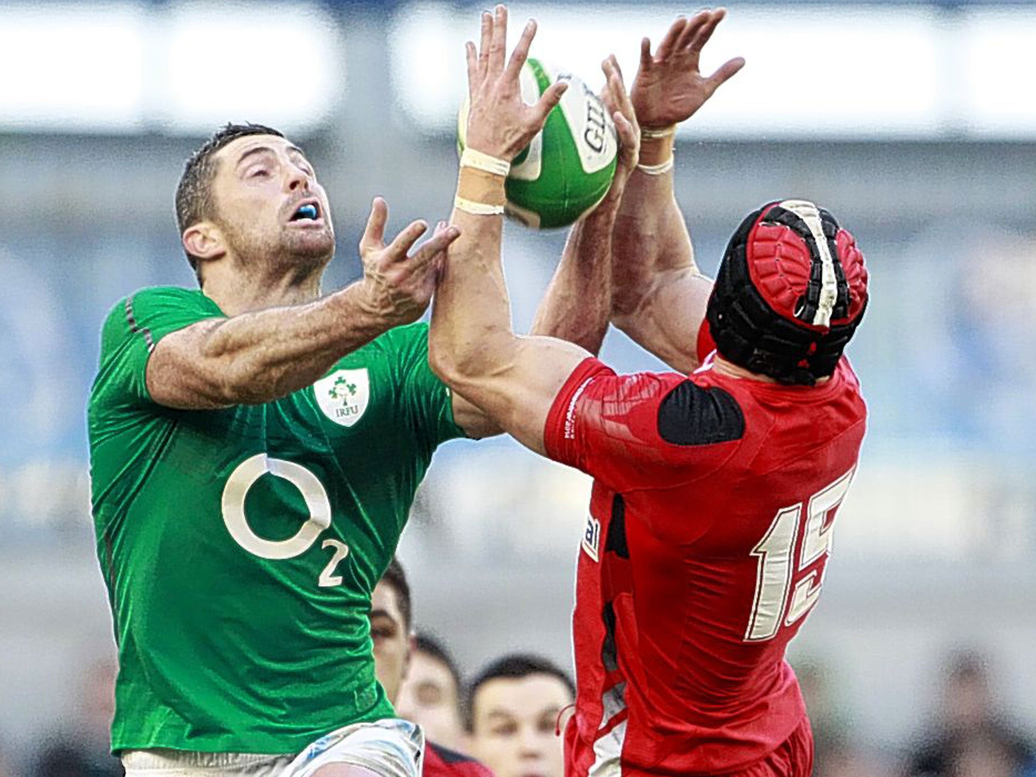 Ireland’s Rob Kearney (left) and Leigh Halfpenny contest a high kick during Wales’ disappointing 26-3 defeat