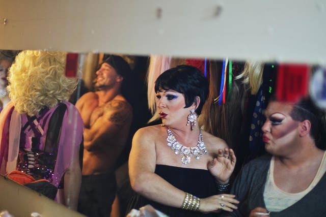 Two performers get ready to go on stage at the Mayak cabaret, the most reputable gay club in Sochi, Russia