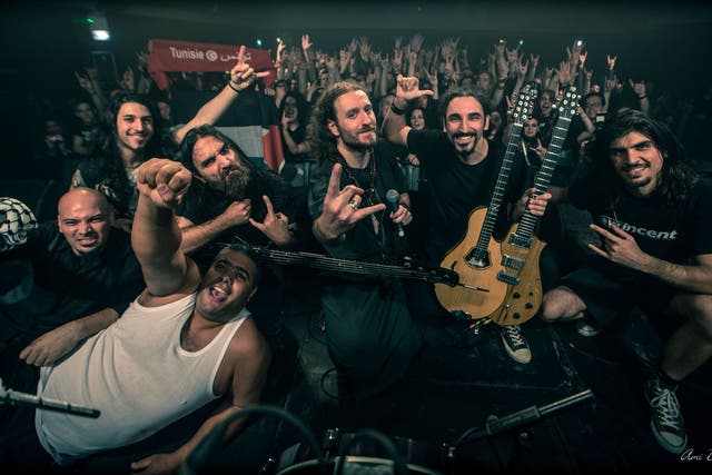 Head-banging for peace: Abed (far left) of Palestinian band Khalas and Kobi (third from right) of Israeli band Orphaned Land