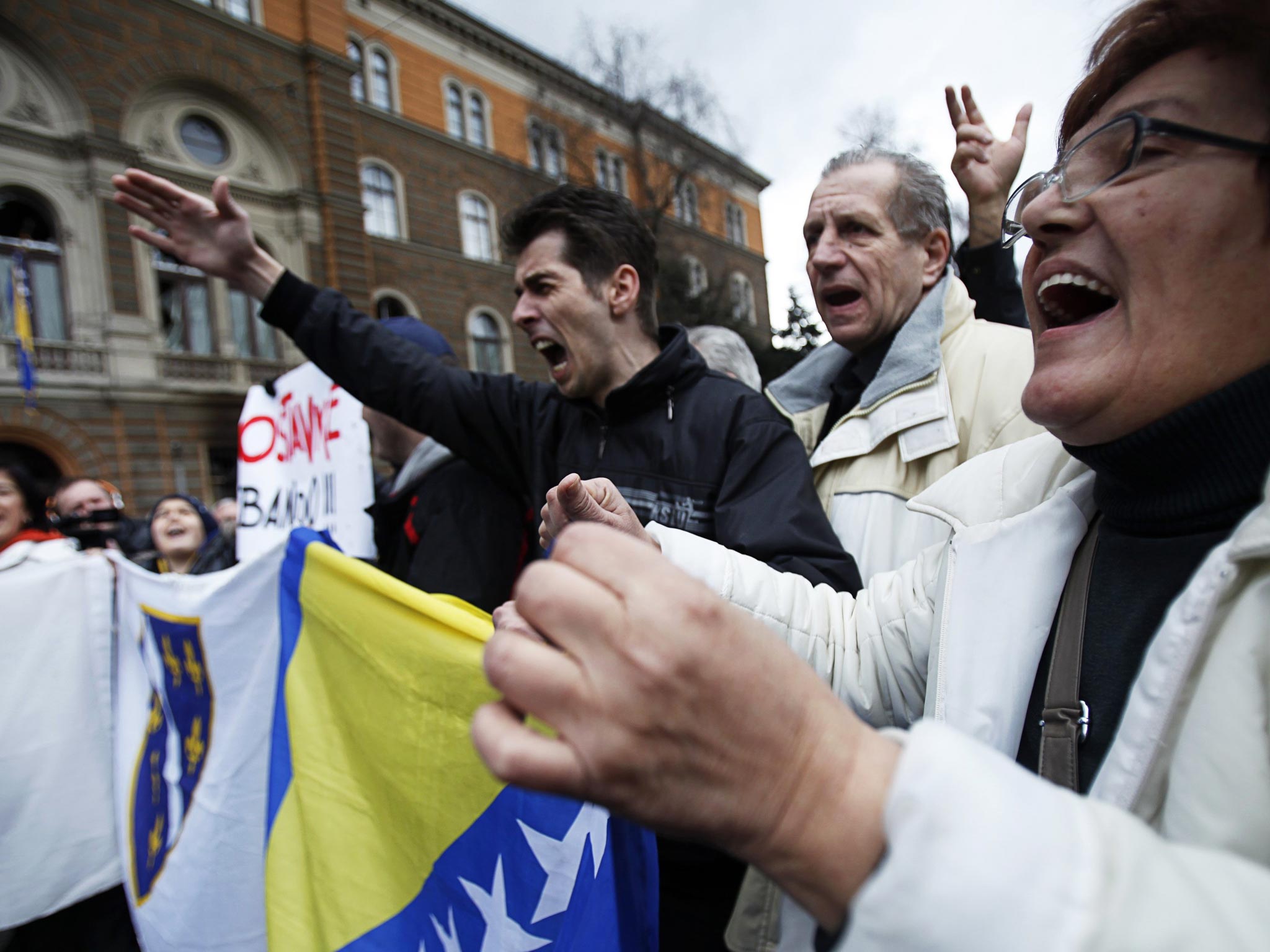 Anti-government protesters protest in front of the Presidency building in Sarajevo