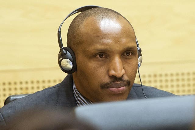 Congolese militia leader Bosco Ntaganda appears at the International Criminal Court charged with war crimes and crimes against humanity in a hearing in The Hague 