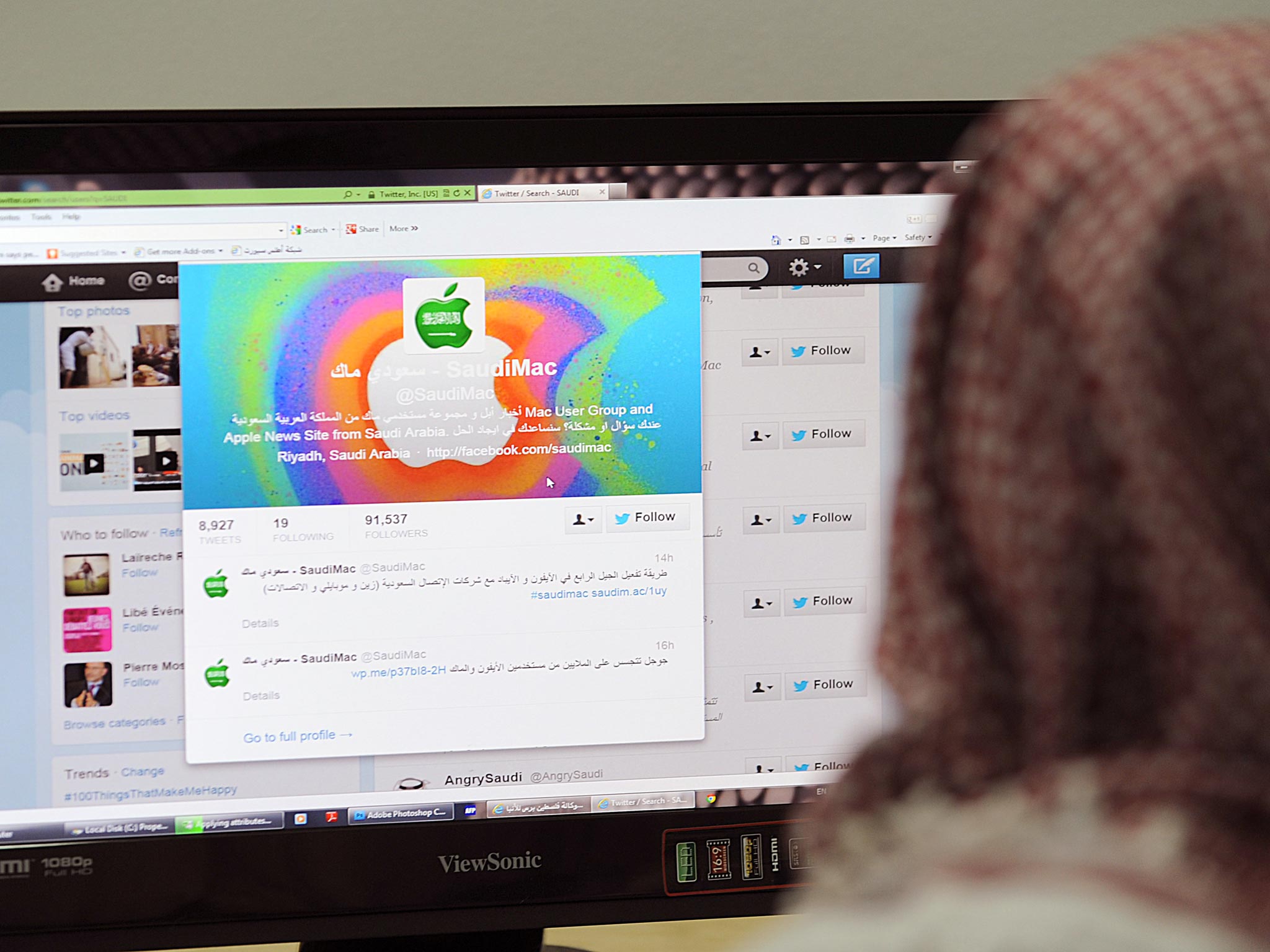 A Saudi man browses through twitter on his desktop in Riyadh, Saudi Arabia