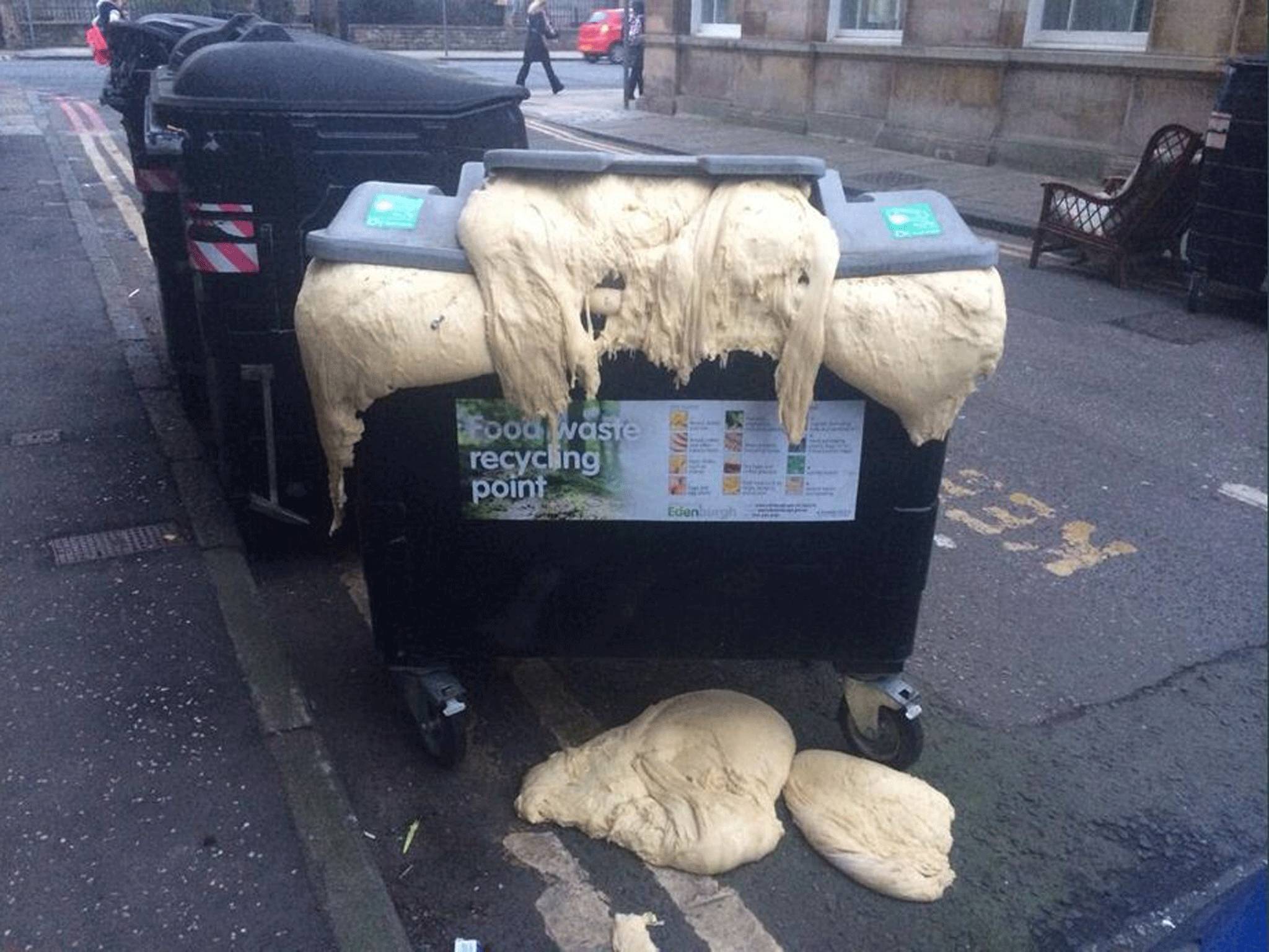 A pedestrian spotted the overflowing (overdoughing?) bin on the walk to work