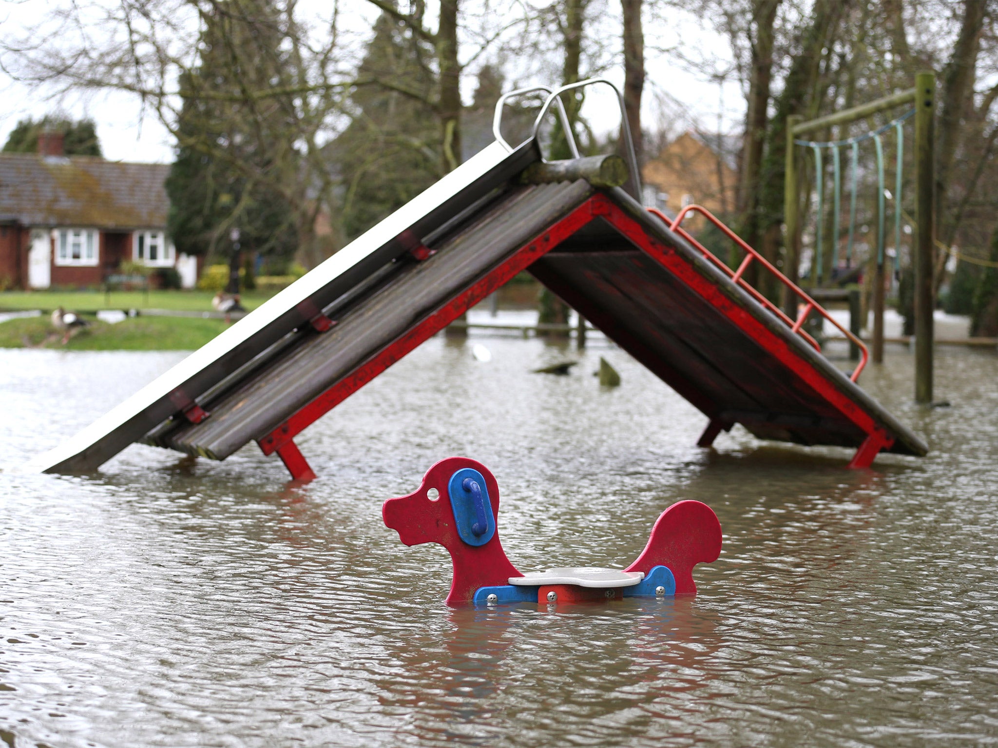 Floodwater reaches a children's playground in Wraysbury (Getty)