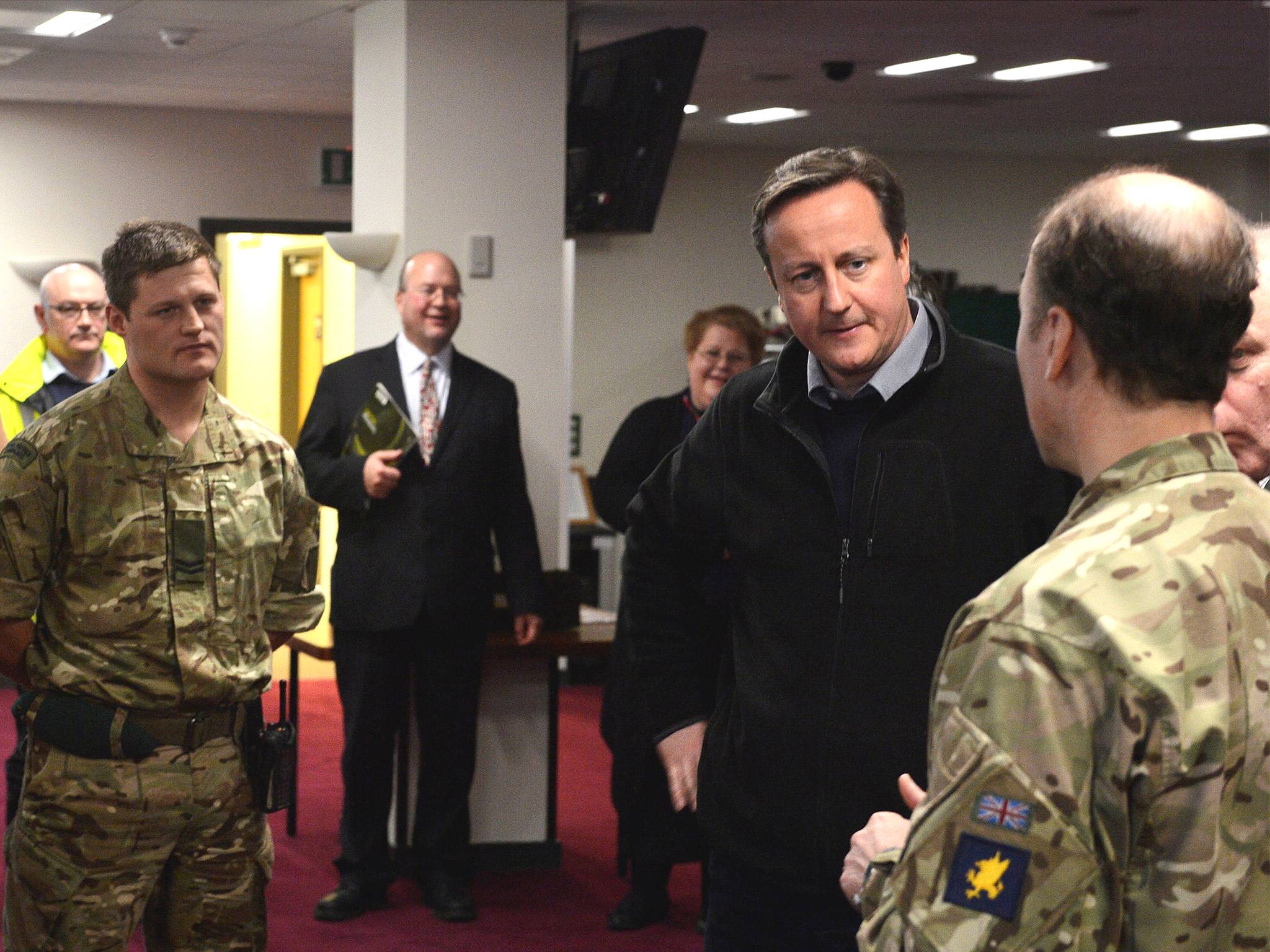 David Cameron with members of 40 Commando Royal Marines involved in relief efforts during his visit to Taunton last Friday
