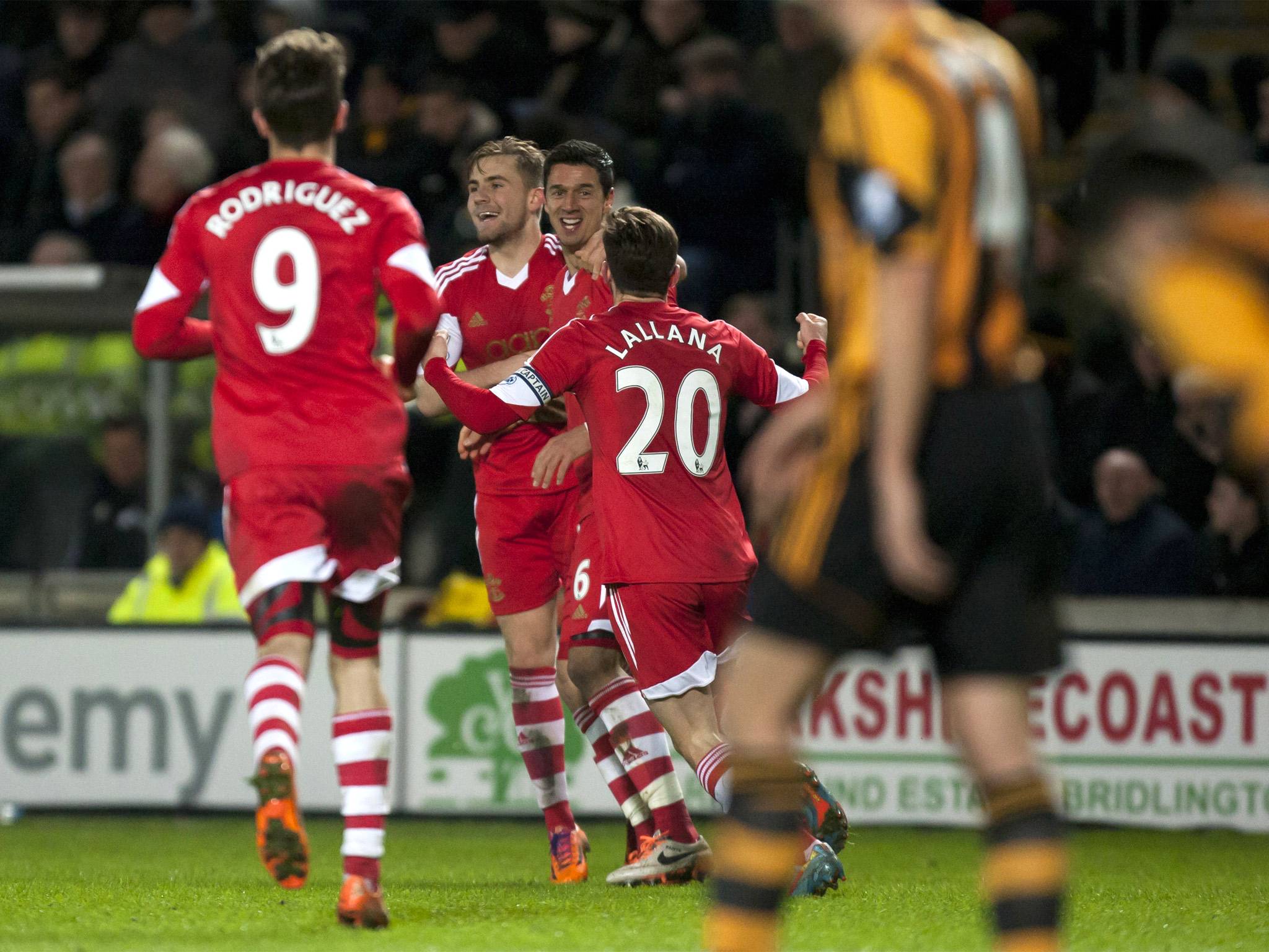 Southampton players join Jose Fonte (centre right) to celebrate his winner