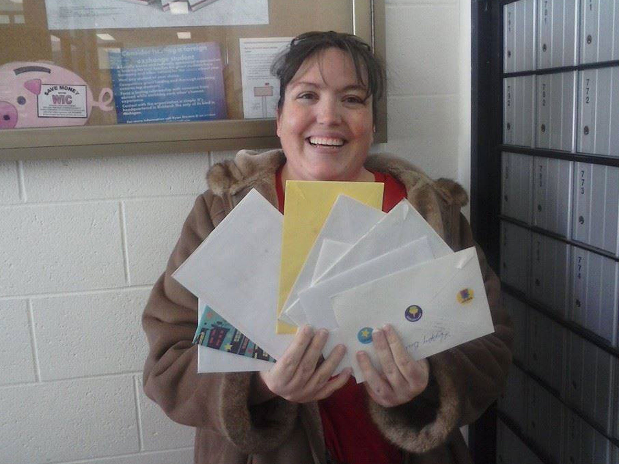 Jennifer collecting the first delivery of cards from the PO box dedicated to Colin's birthday