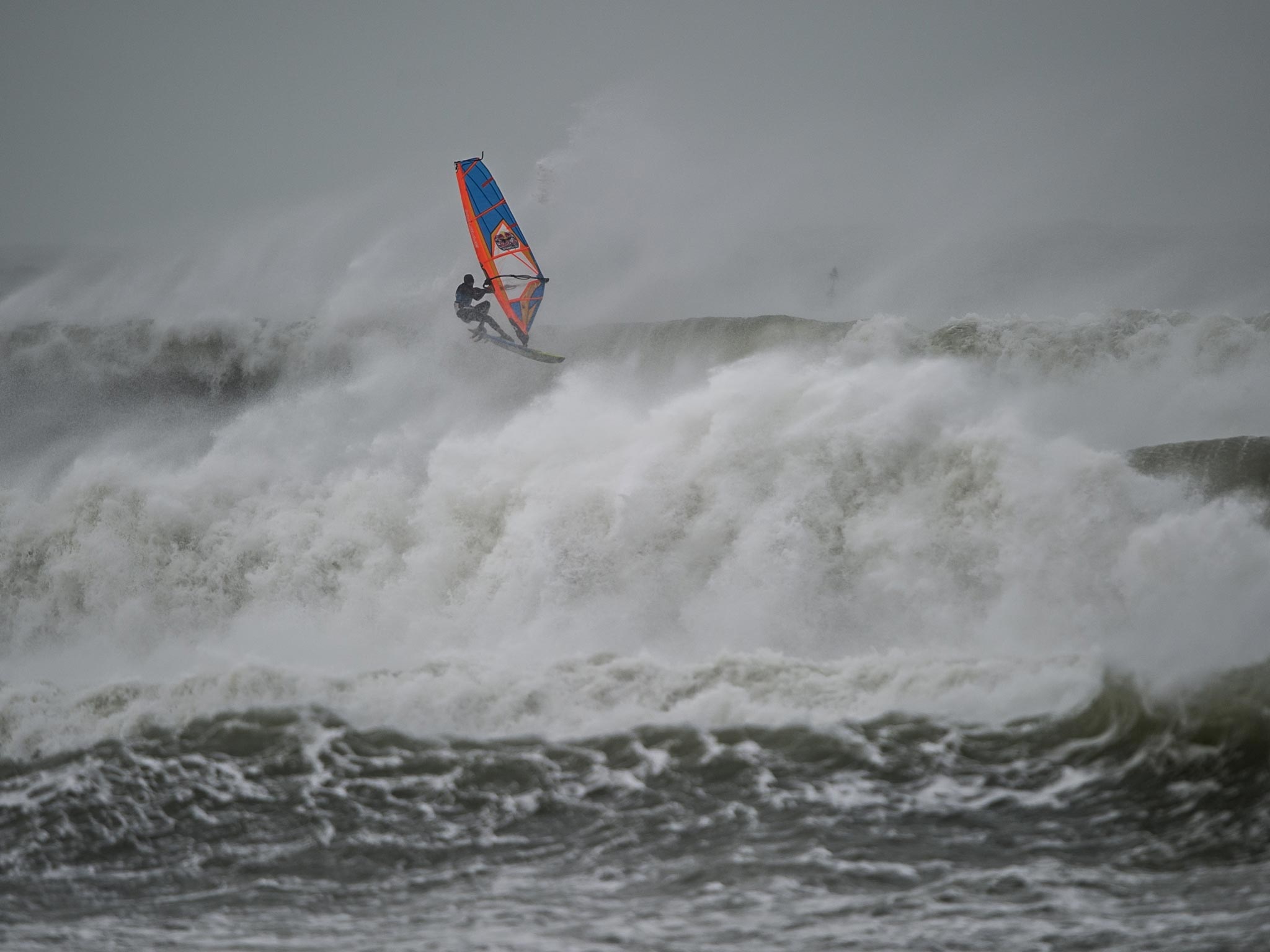 Winner Thomas Traversa rides the waves in 80mph winds
