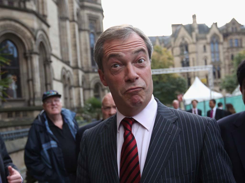 Nigel Farage, the leader of the UK Independence Party, arrives to speak at a fringe event to the second day of the Conservative Party Conference in Manchester Town Hall on September 30, 2013 in Manchester, England.