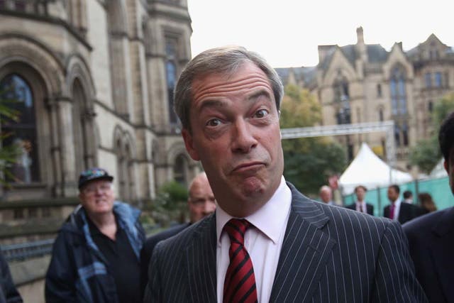 Nigel Farage, the leader of the UK Independence Party, arrives to speak at a fringe event to the second day of the Conservative Party Conference in Manchester Town Hall on September 30, 2013 in Manchester, England. 