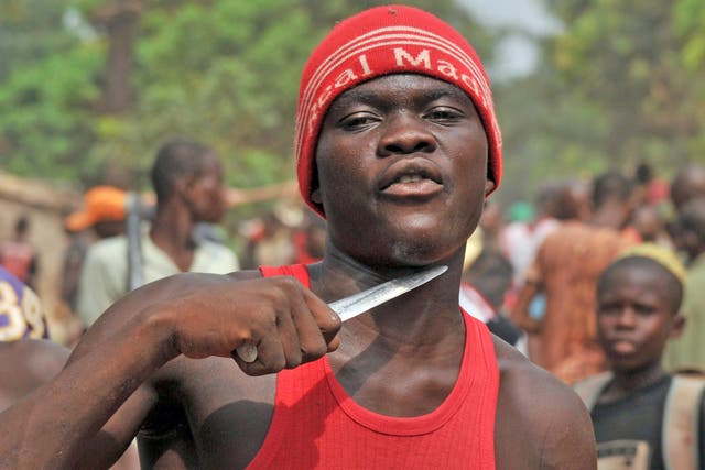 A Christian militiaman in Bangui claiming to be looking for Muslims