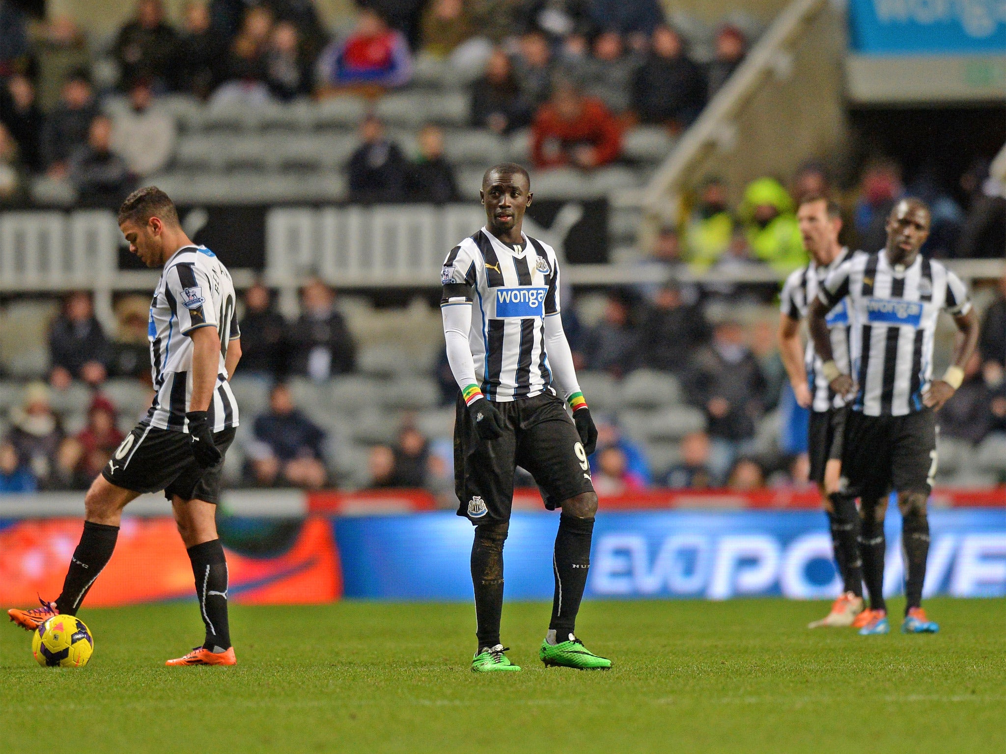 The Newcastle players look shell-shocked after they concede a fourth (Getty)