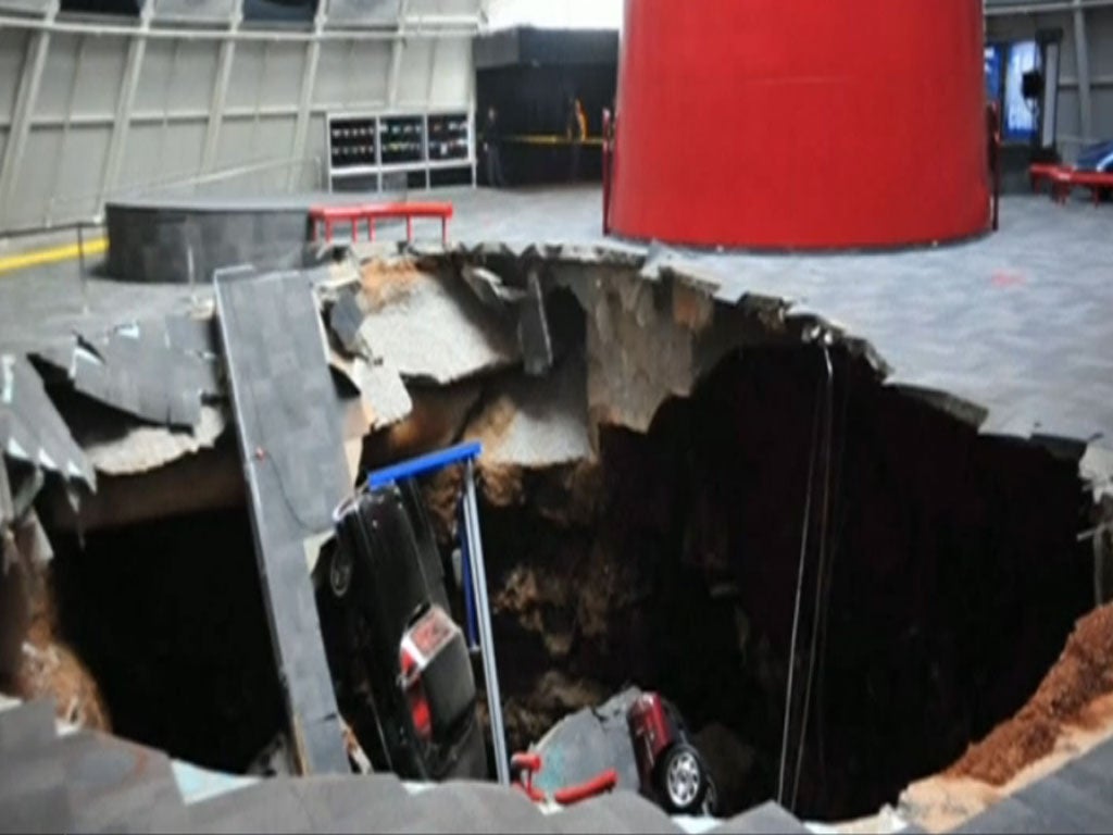 The damage caused by a sinkhole, which swallowed up eight rare cars, at the National Corvette Museum in Kentucky.