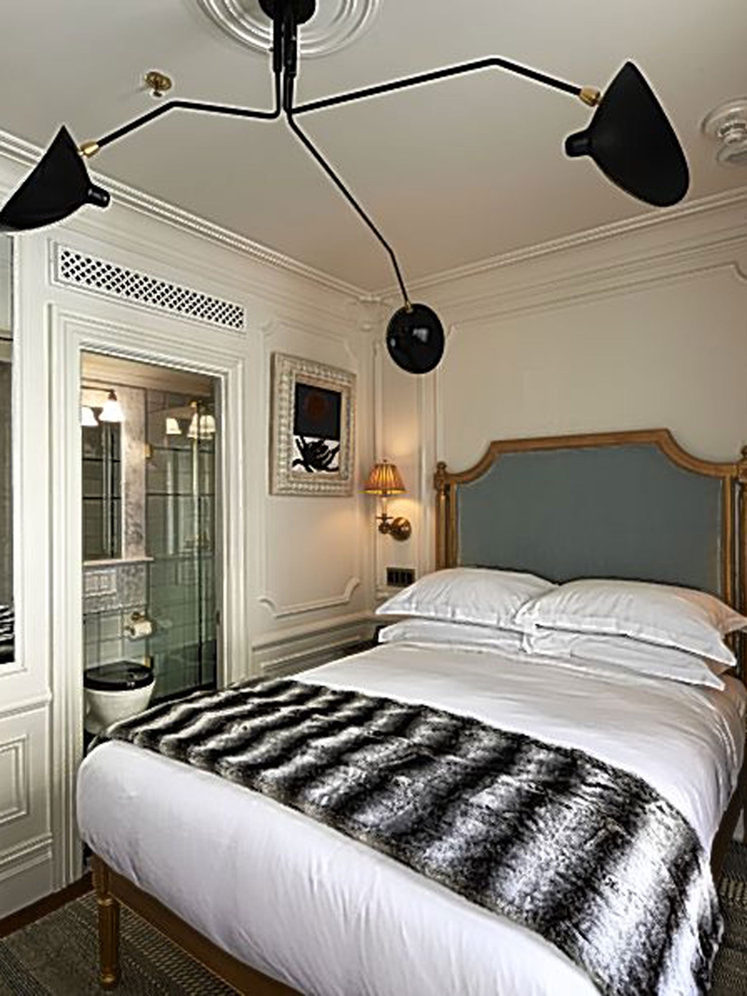 The hotel calls its 107 rooms 'chic petite' and they are certainly both of those things