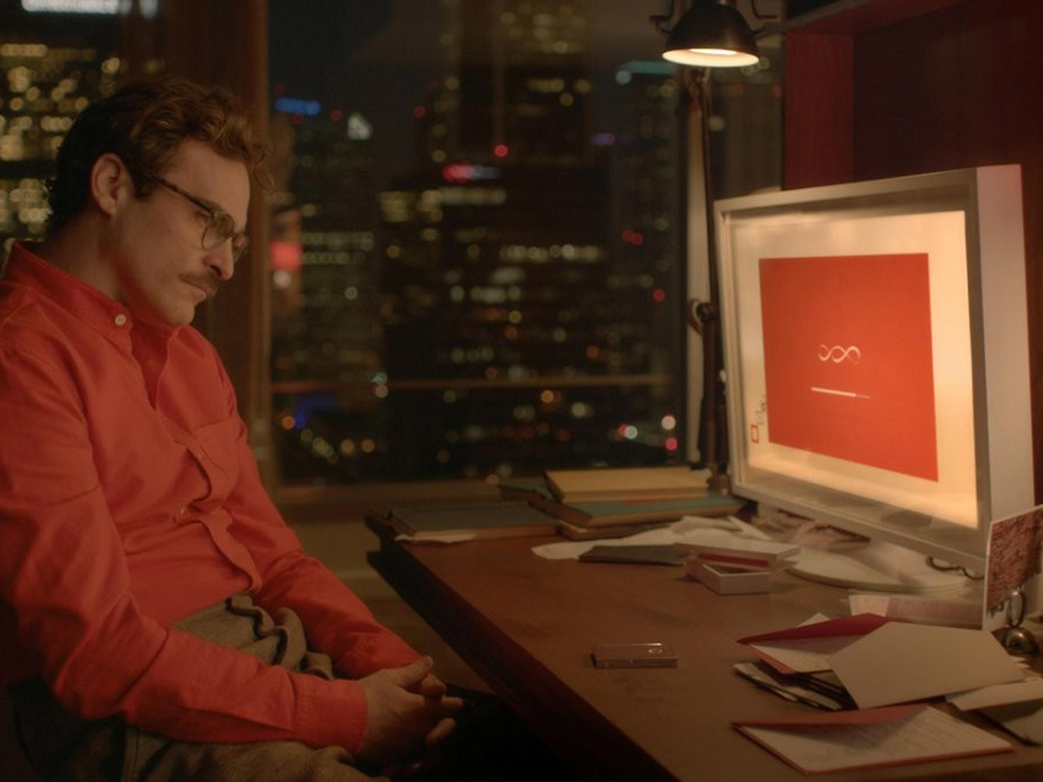 Joaquin Phoenix as Theodore Twombly, who falls in love with a computer, in ‘Her’