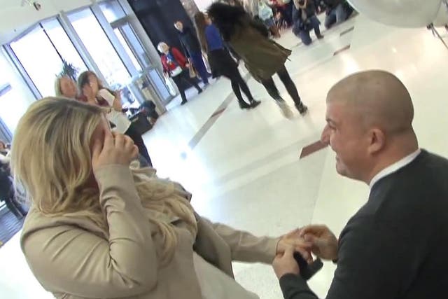 Moment of troth: Bobby Beattie proposes to girlfriend Laura in the
Braehead Shopping Centre