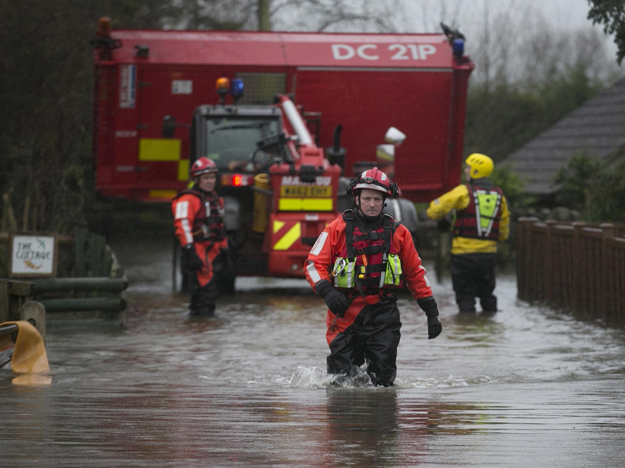 Devon and Somerset Fire service deliver a pump to residents flooded in Fordgate on the Somerset Levels near Bridgwater