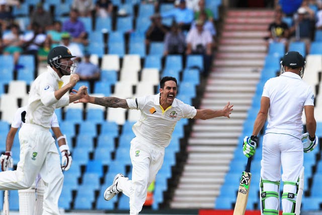 Mitchell Johnson celebrates taking the wicket of Faf du Plessis with a 93mph delivery