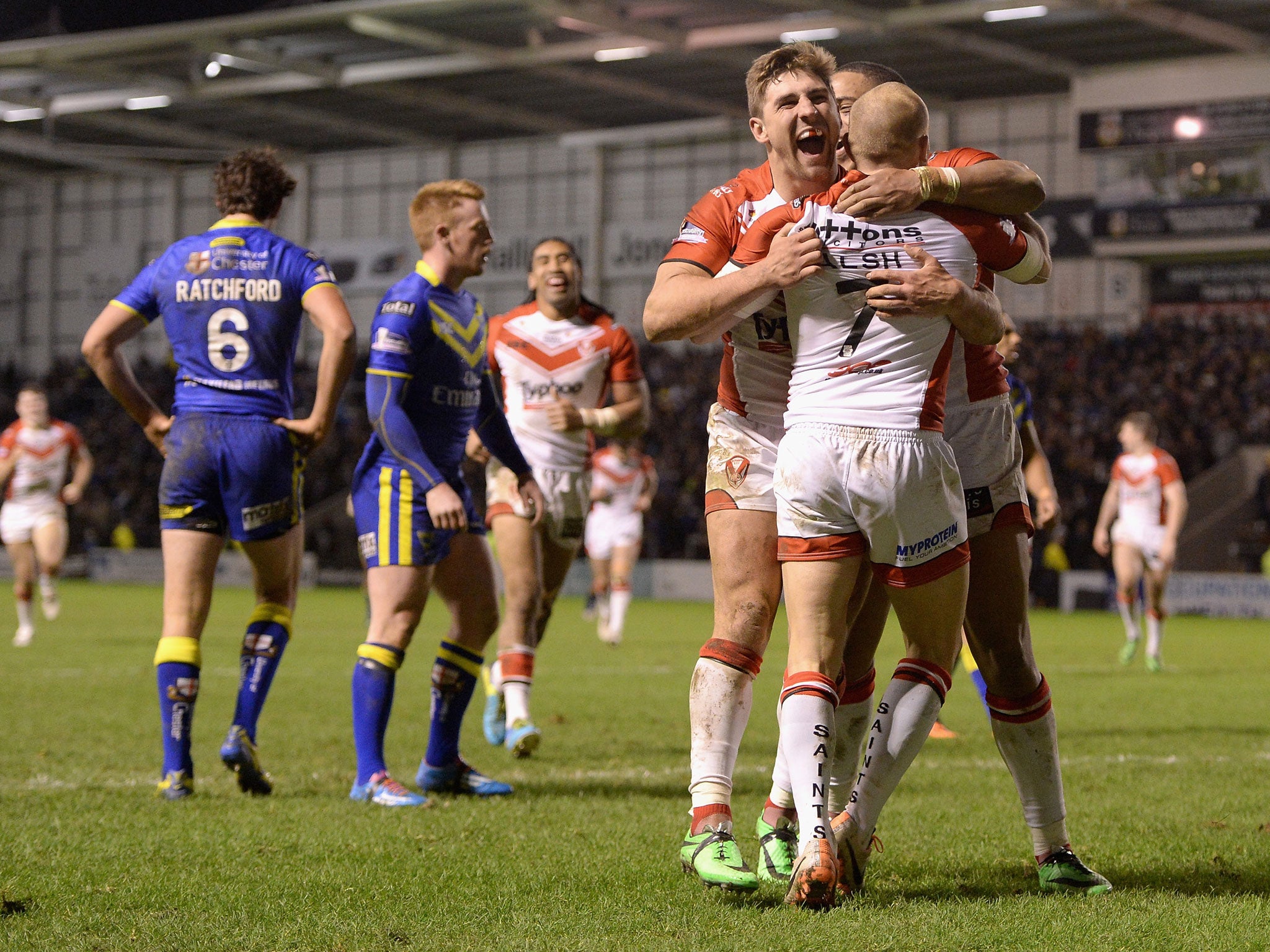 St Helens players celebrate after Luke Marsh scores the final try in the 38-8 win over Warrington Wolves