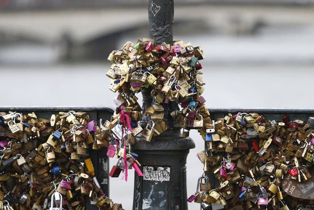 The love padlocks have multiplied to damaging levels on Paris bridges