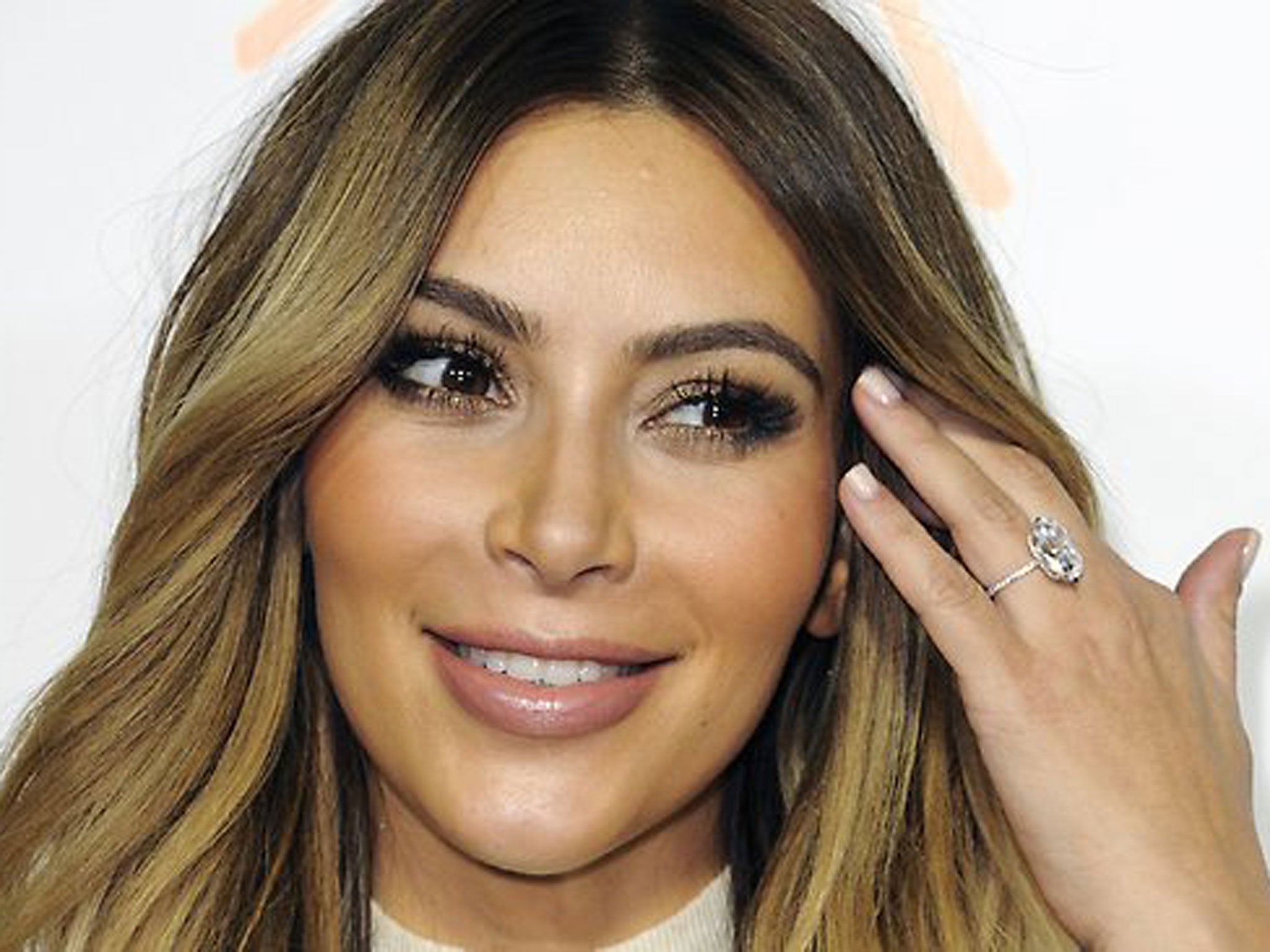 Kim Kardashian wears her 15-carat diamond engagement ring