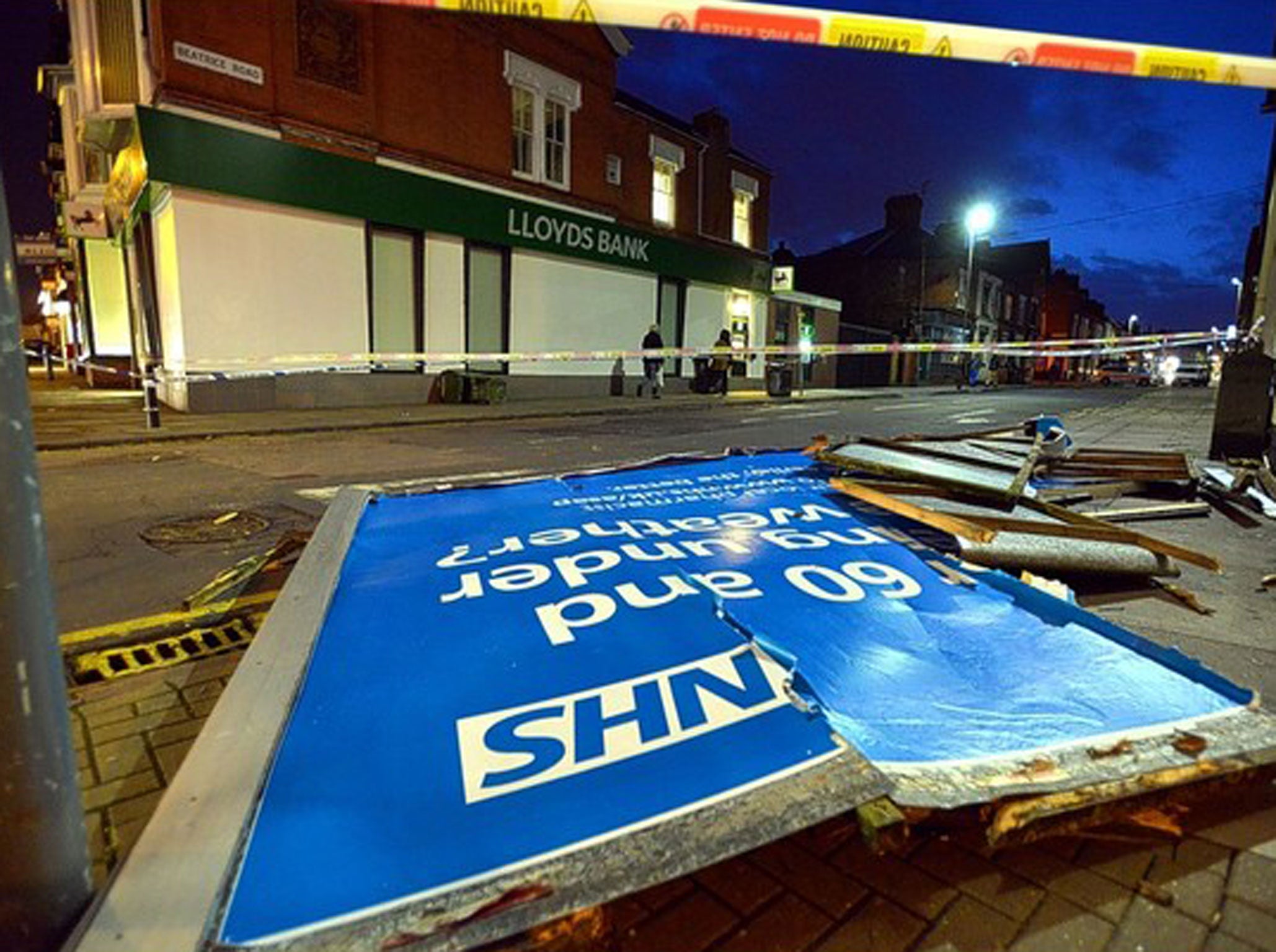 A "feeling under the weather sign" was blown off an advertising board by gale force winds, hitting a man on his head.