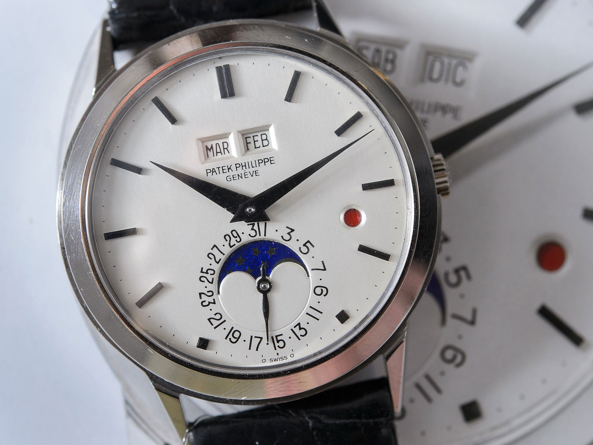 A perpetual calendar wristwatch with moon phases and leap-year by Swiss watchmaker Patek Philippe