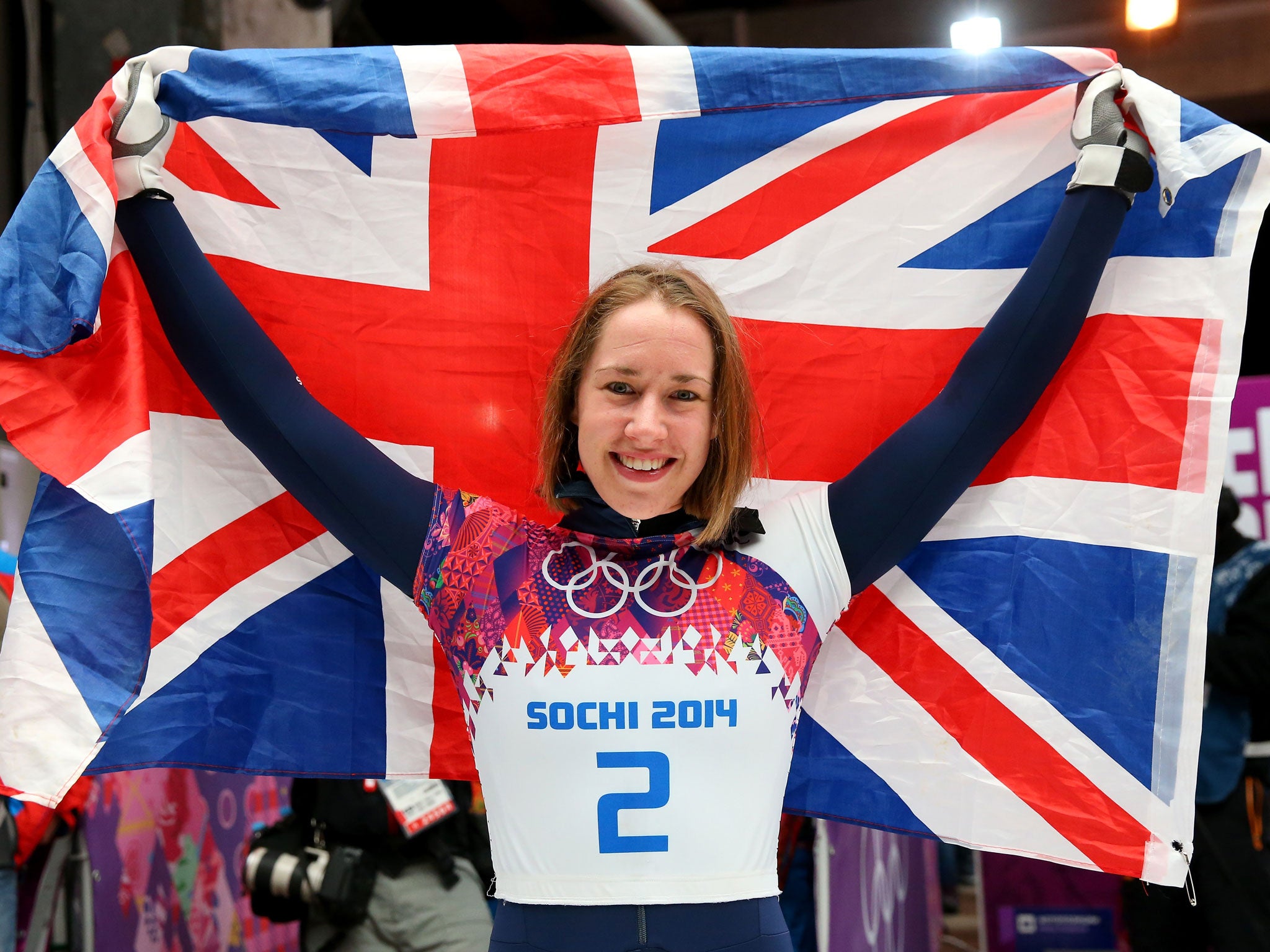 Lizzy Yarnold celebrates her victory for Great Britain in the skeleton in Sochi