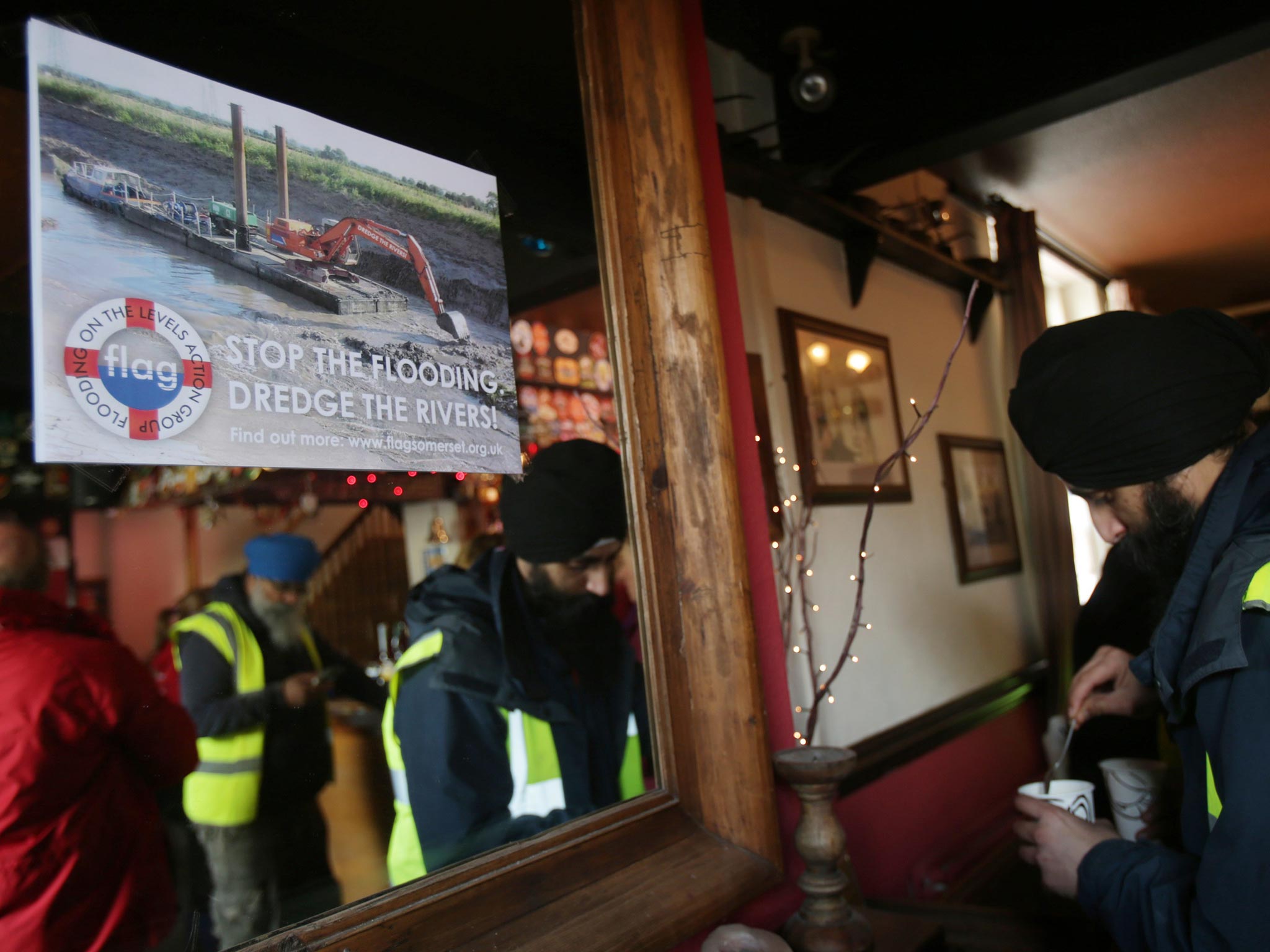 Volunteers take refreshments at the King Alfred Inn at Burrowbridge on the Somerset Levels