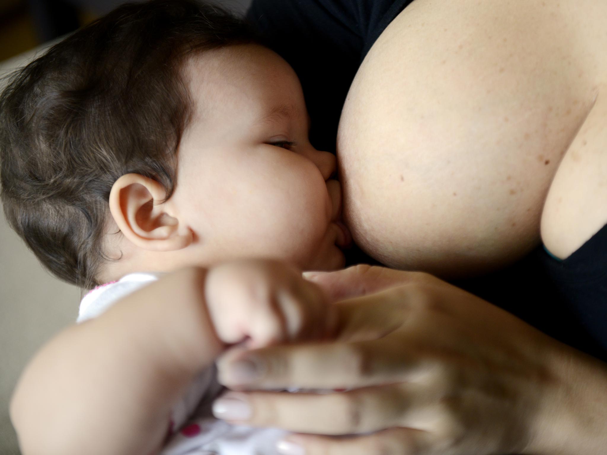 File image: US laws protect a mother's right to breastfeed in public, with or without covering up
