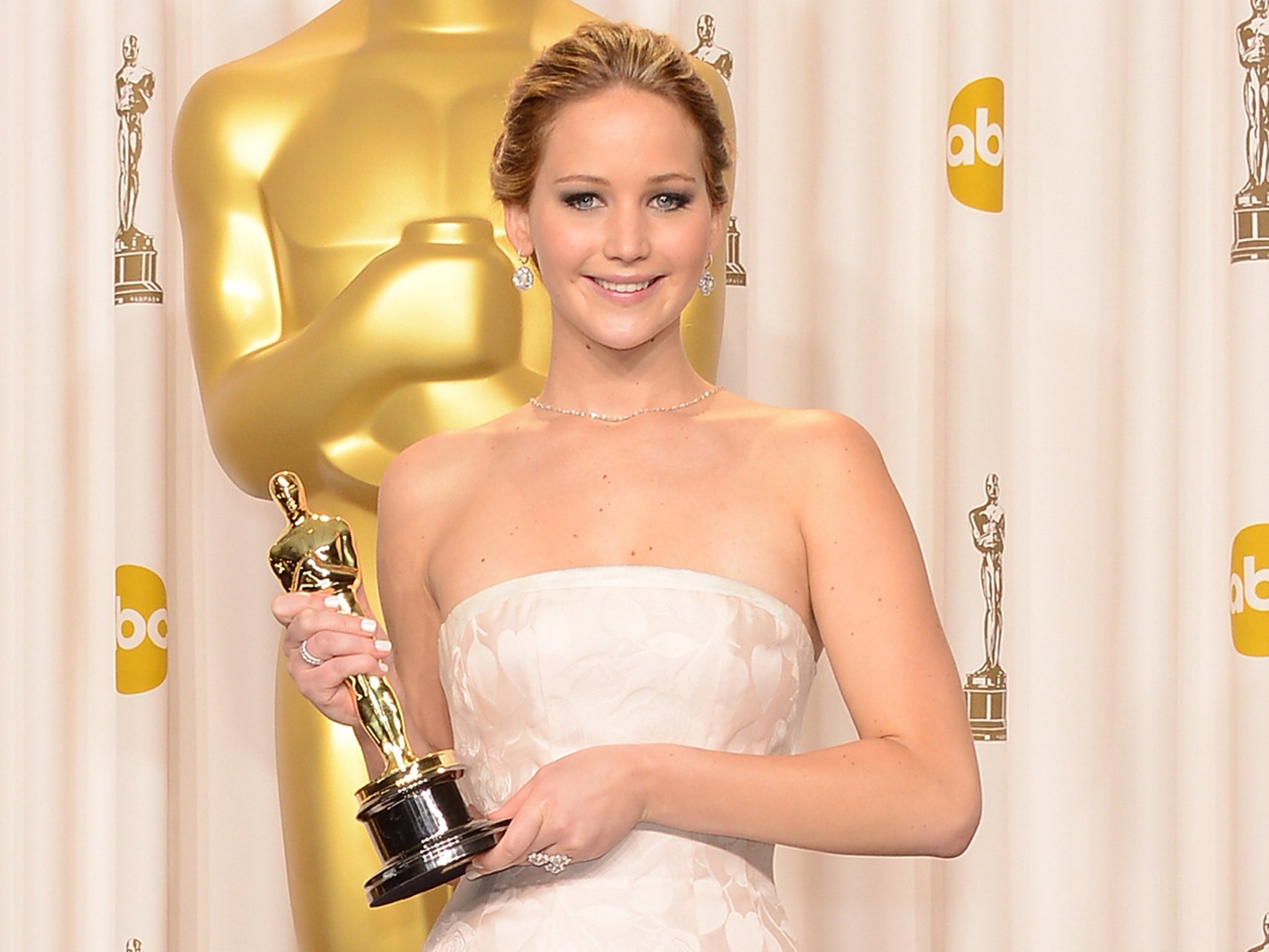 Jennifer Lawrence poses with her award after winning Best Actress for Silver Linings Playbook at the 2013 Oscars