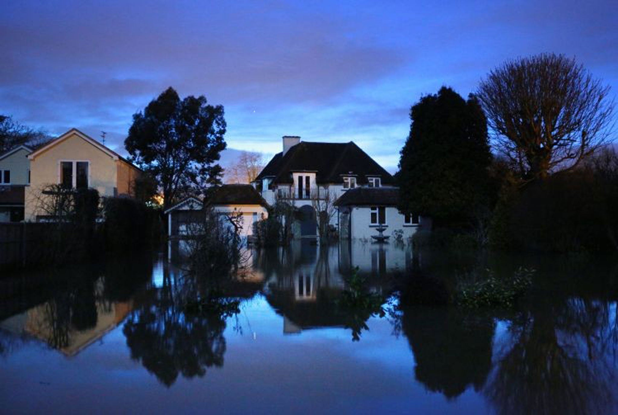 Cut off: Flooded homes in the village of Wraysbury