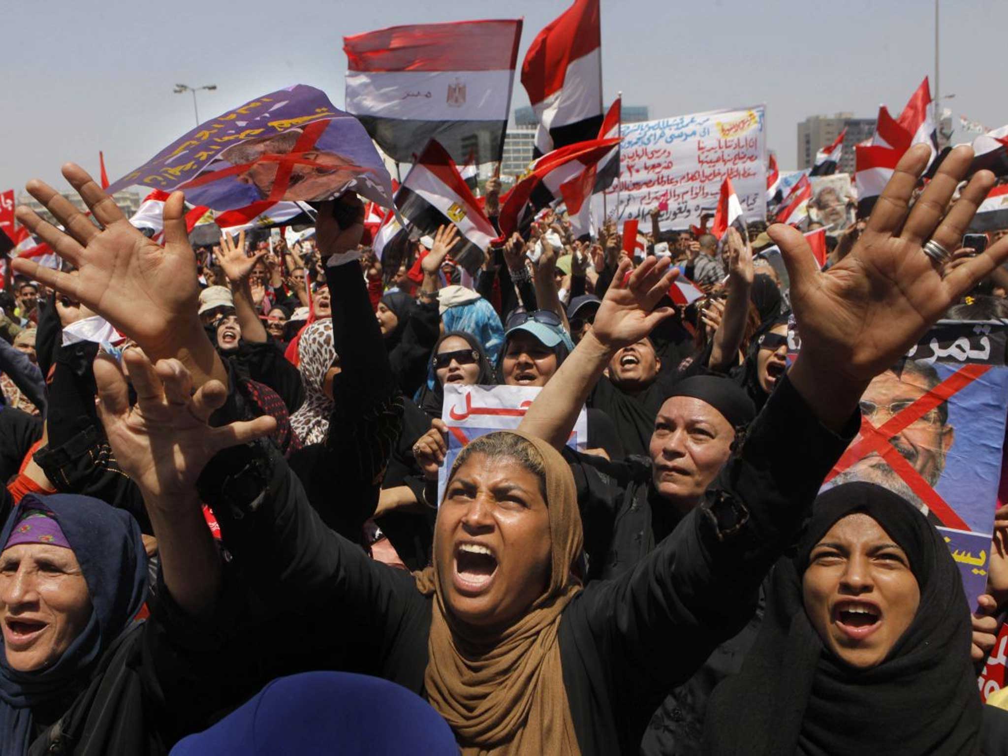 Egyptians protesting in June against President Mohamed Morsi, who was voted in the year before