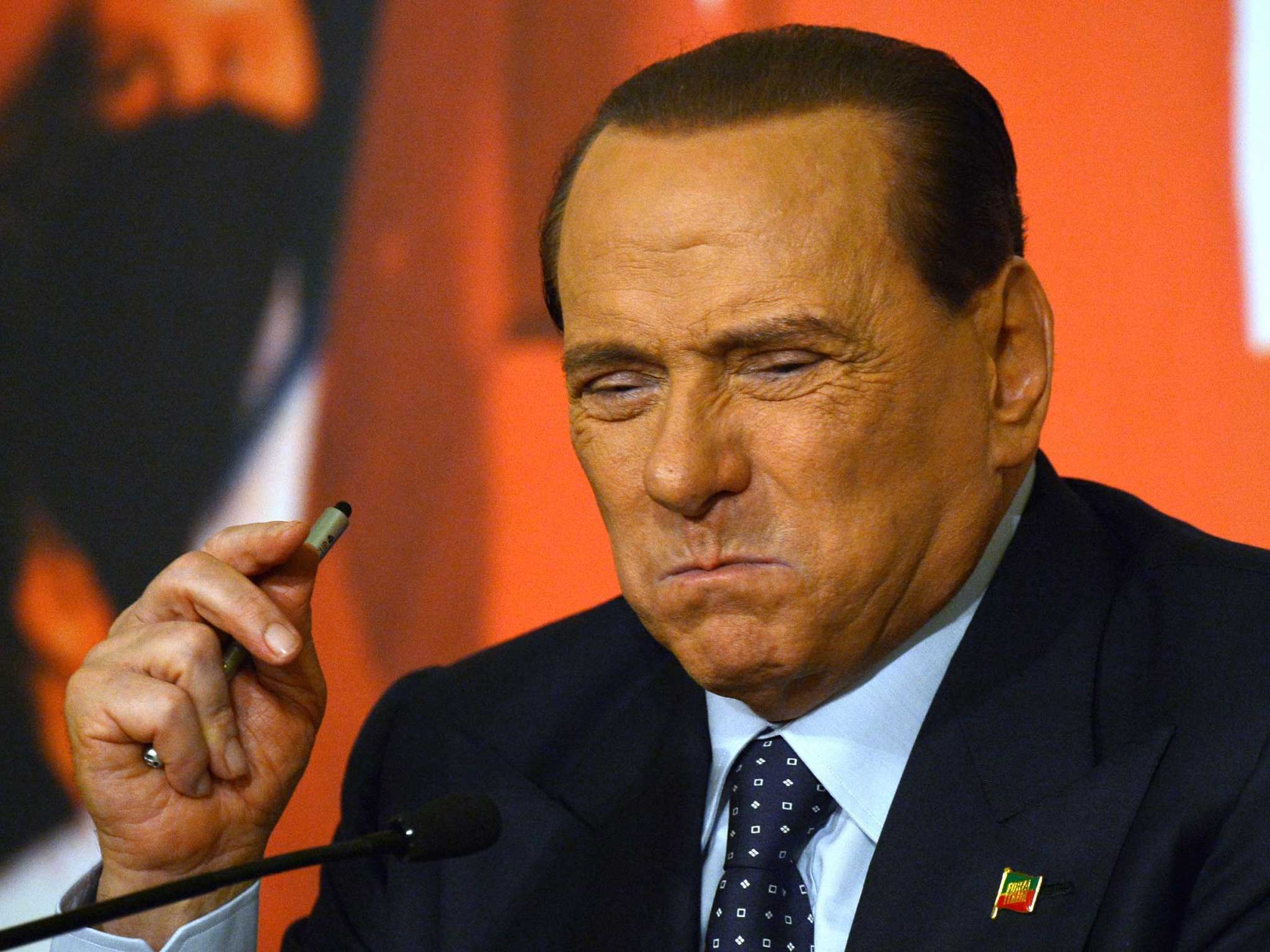 Italy's former prime minister Silvio Berlusconi speaks during a press conference