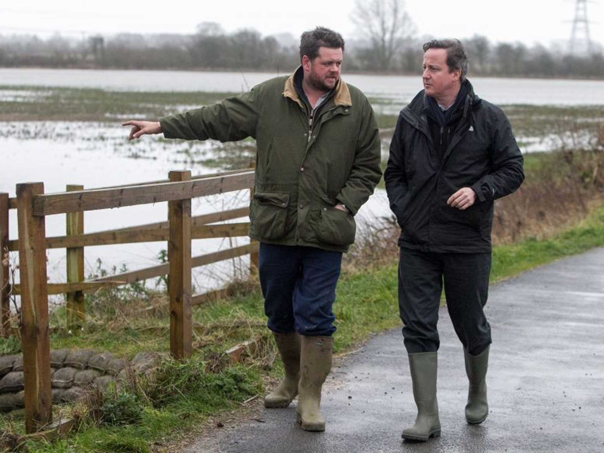 Fact-finding mission: the PM chats to flooded farmers in Somerset and Oxfordshire