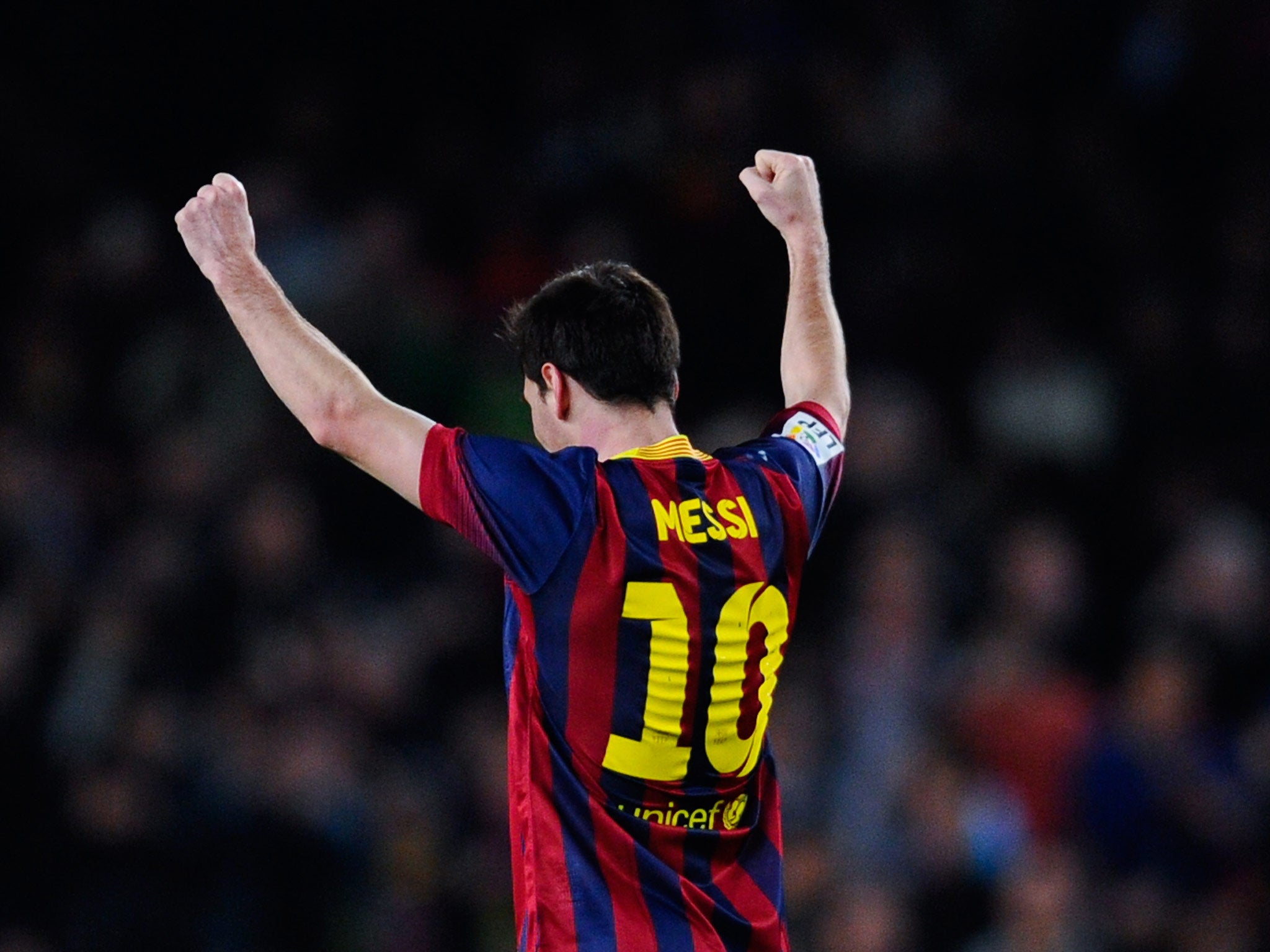 Lionel Messi celebrates a goal for Barcelona