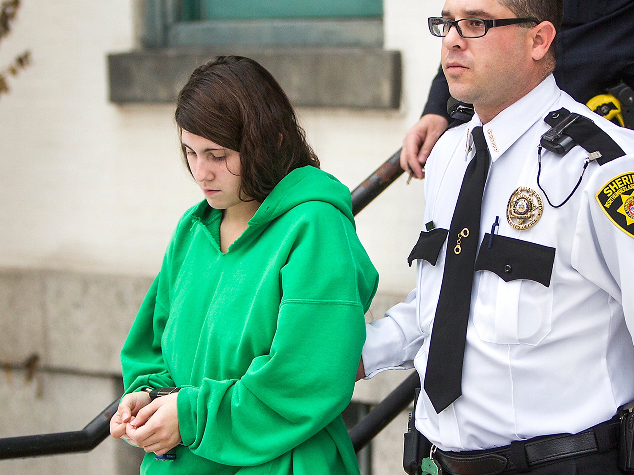Miranda Barbour is led out of the courthouse after her preliminary hearing in Sunbury