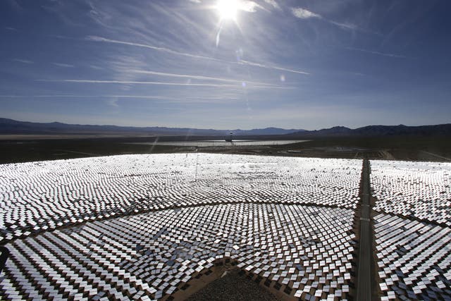 Some of Ivanpah's 300,000 computer-controlled mirrors, each about 7 feet high and 10 feet wide, reflect sunlight to boilers that sit on 459-foot towers