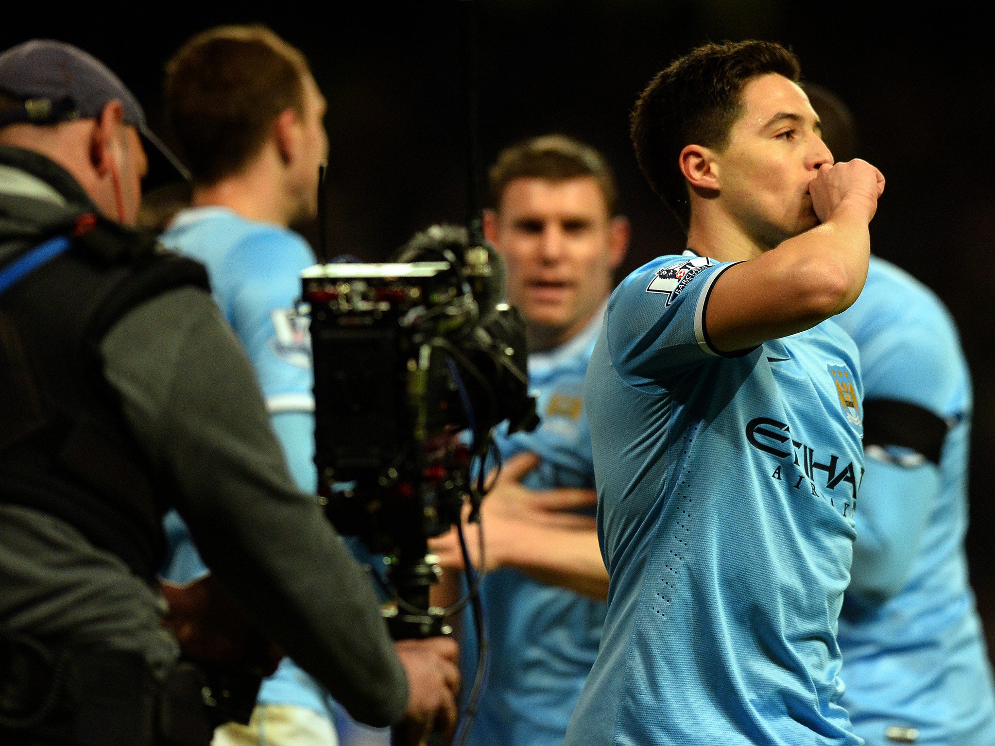 Samir Nasri pictured celebrating Manchester City's FA Cup win over Chelsea