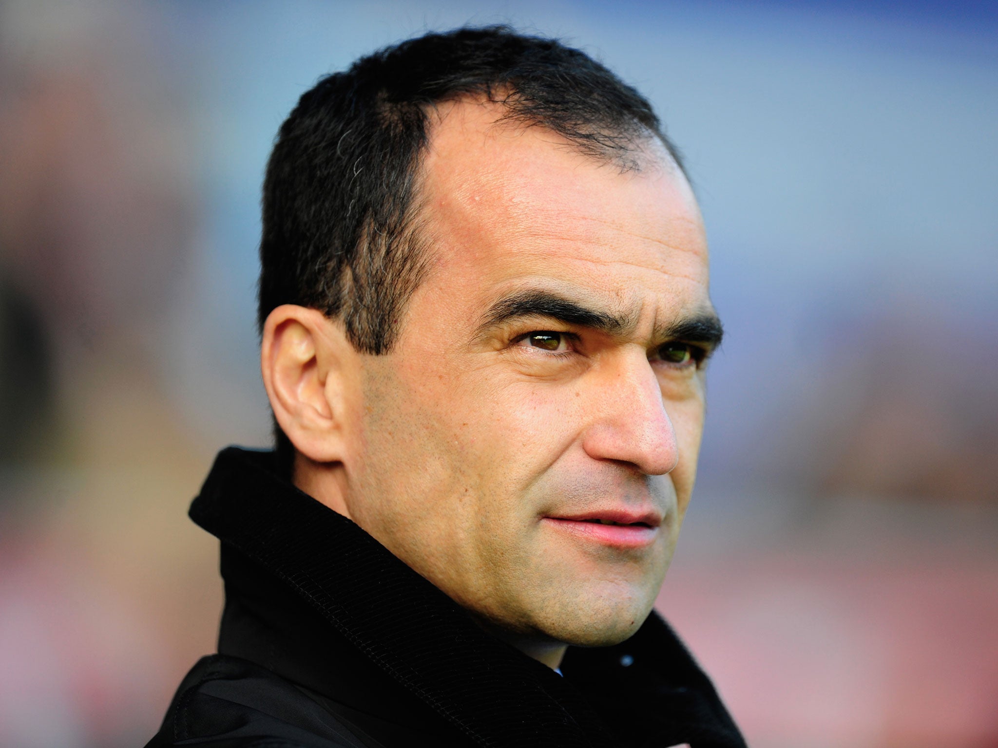 Everton manager Roberto Martinez looks on from the touchline