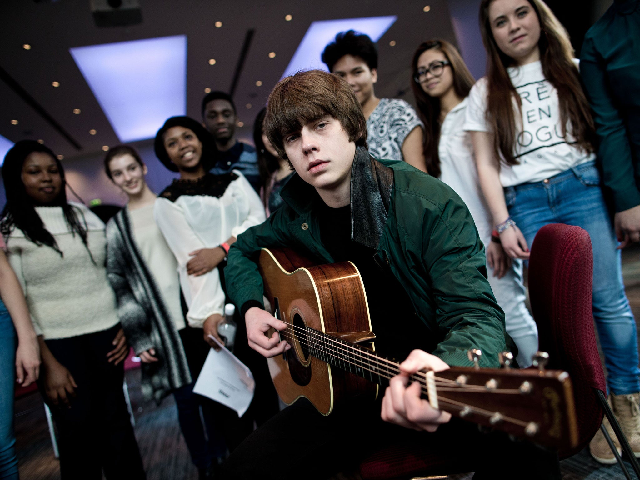 Singer-songwriter Jake Bugg photographed in the Elgar Room at the Royal Albert Hall with 10 young vocalists from schools in the Tri-Borough Music Hub