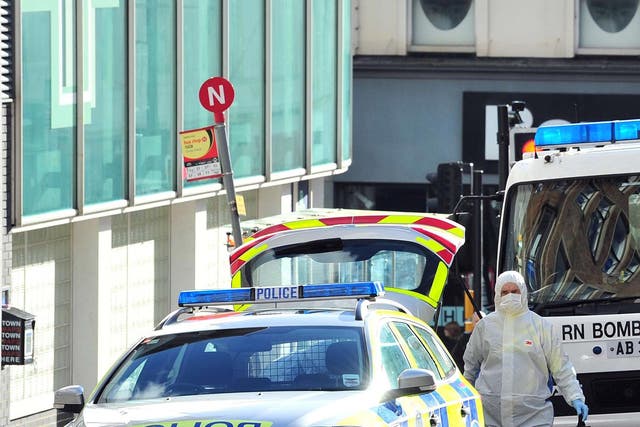 A bygone age: bomb disposal experts at the scene of a suspect package in Brighton last week