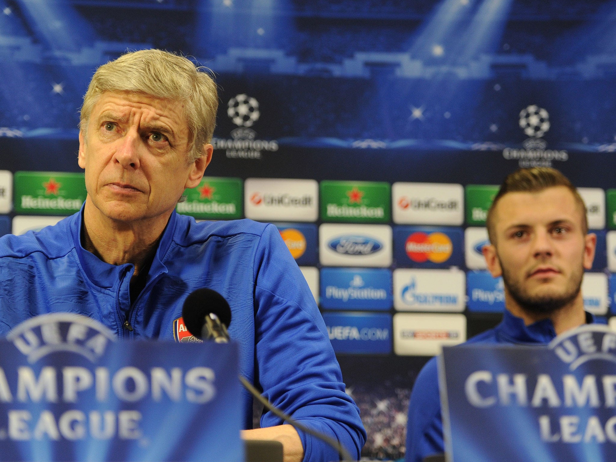 Arsene Wenger and Jack Wilshere talk to the press