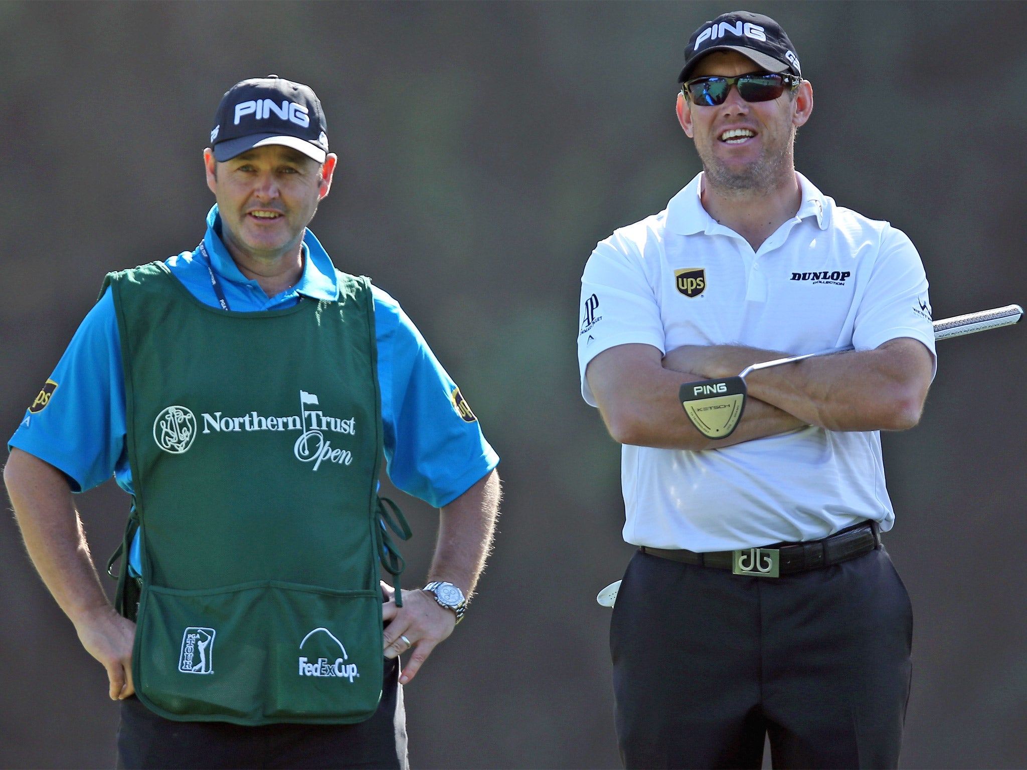 Lee Westwood (right) had Billy Foster caddying for him when he became world No 1 in 2010